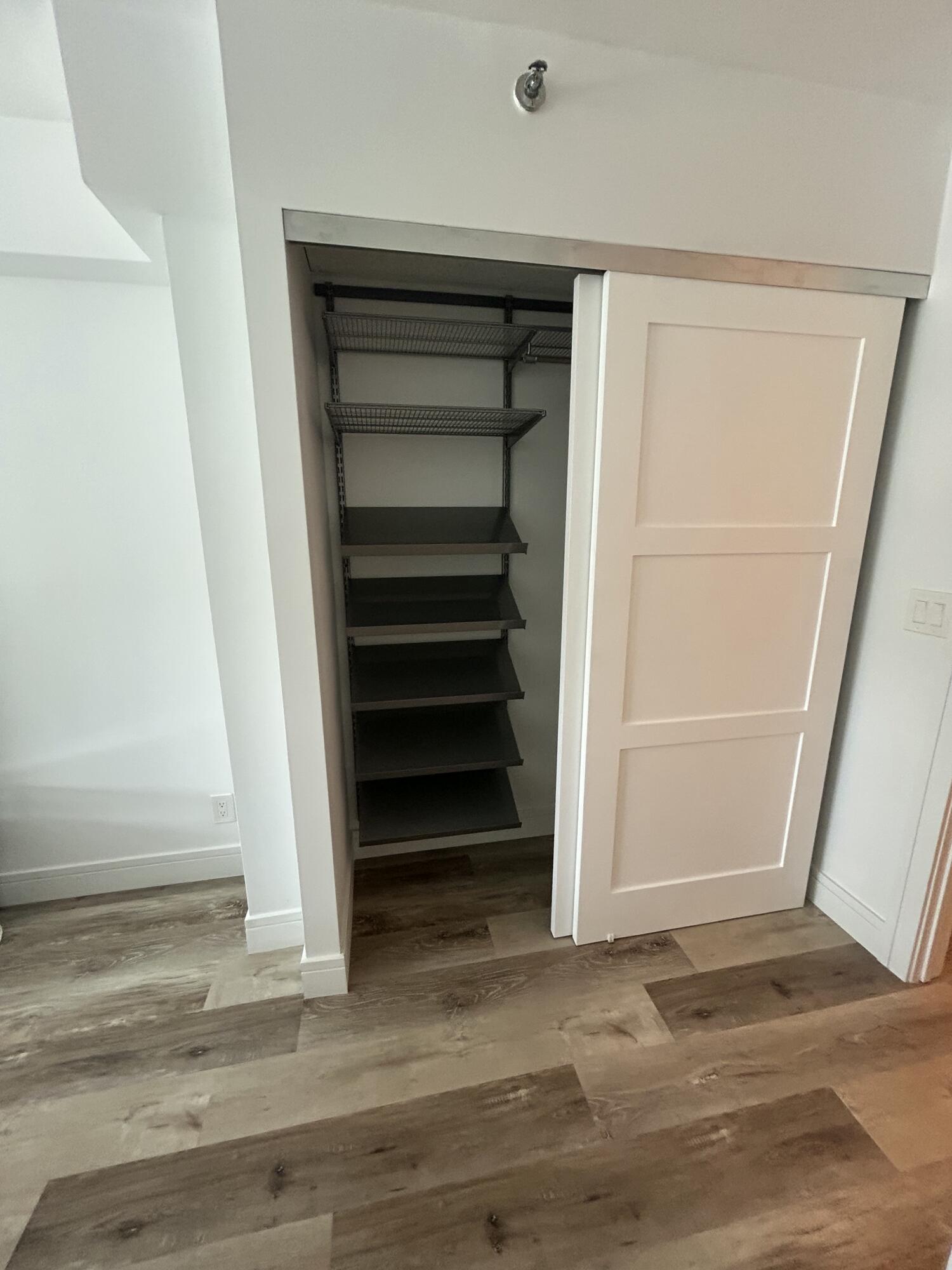 4511 South Ocean Boulevard, Unit 204 Highland Beach, FL 33487 - Photo 12 of 19 a view of walk in closet with empty racks