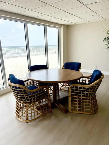 a view of table and chair in the room