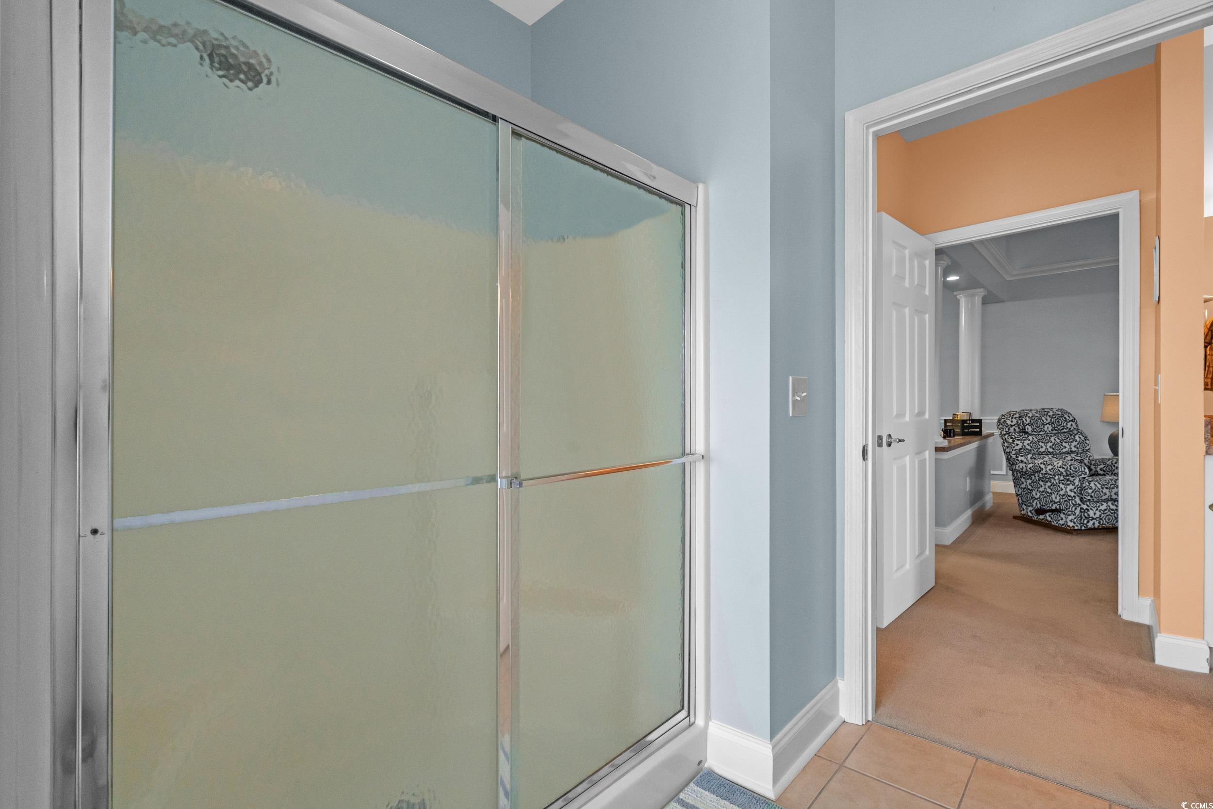 70 Addison Cottage Way, Unit 322 Murrells Inlet, SC 29576 - Photo 21 of 40 Full bath featuring a stall shower and light tile patterned flooring