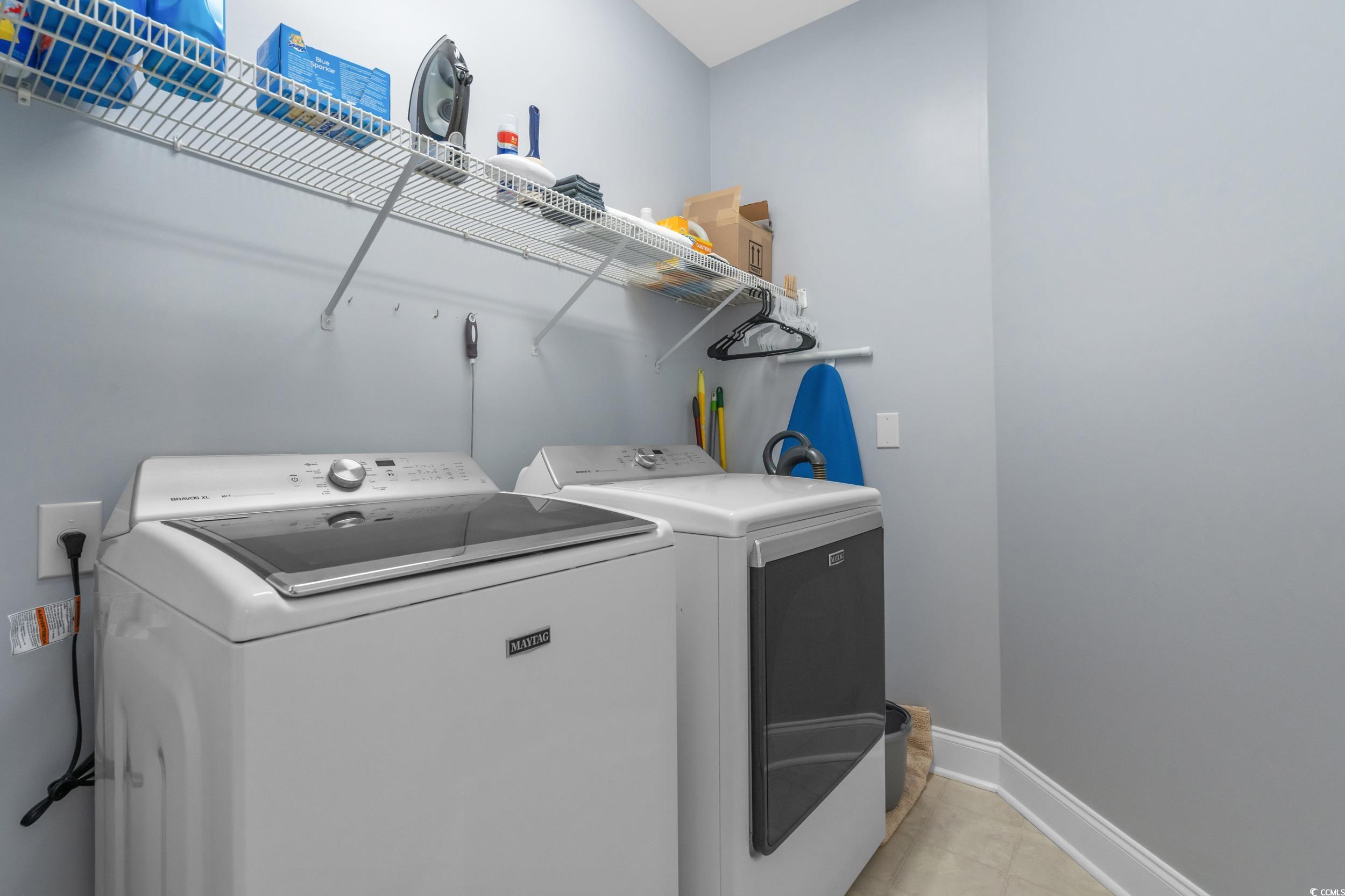 70 Addison Cottage Way, Unit 322 Murrells Inlet, SC 29576 - Photo 23 of 40 Laundry room with independent washer and dryer and baseboards