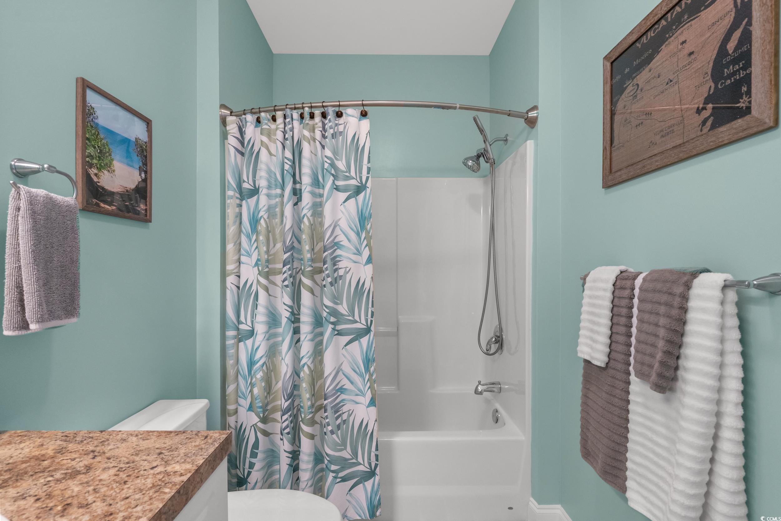 70 Addison Cottage Way, Unit 322 Murrells Inlet, SC 29576 - Photo 27 of 40 Bathroom featuring shower / bathtub combination with curtain and vanity