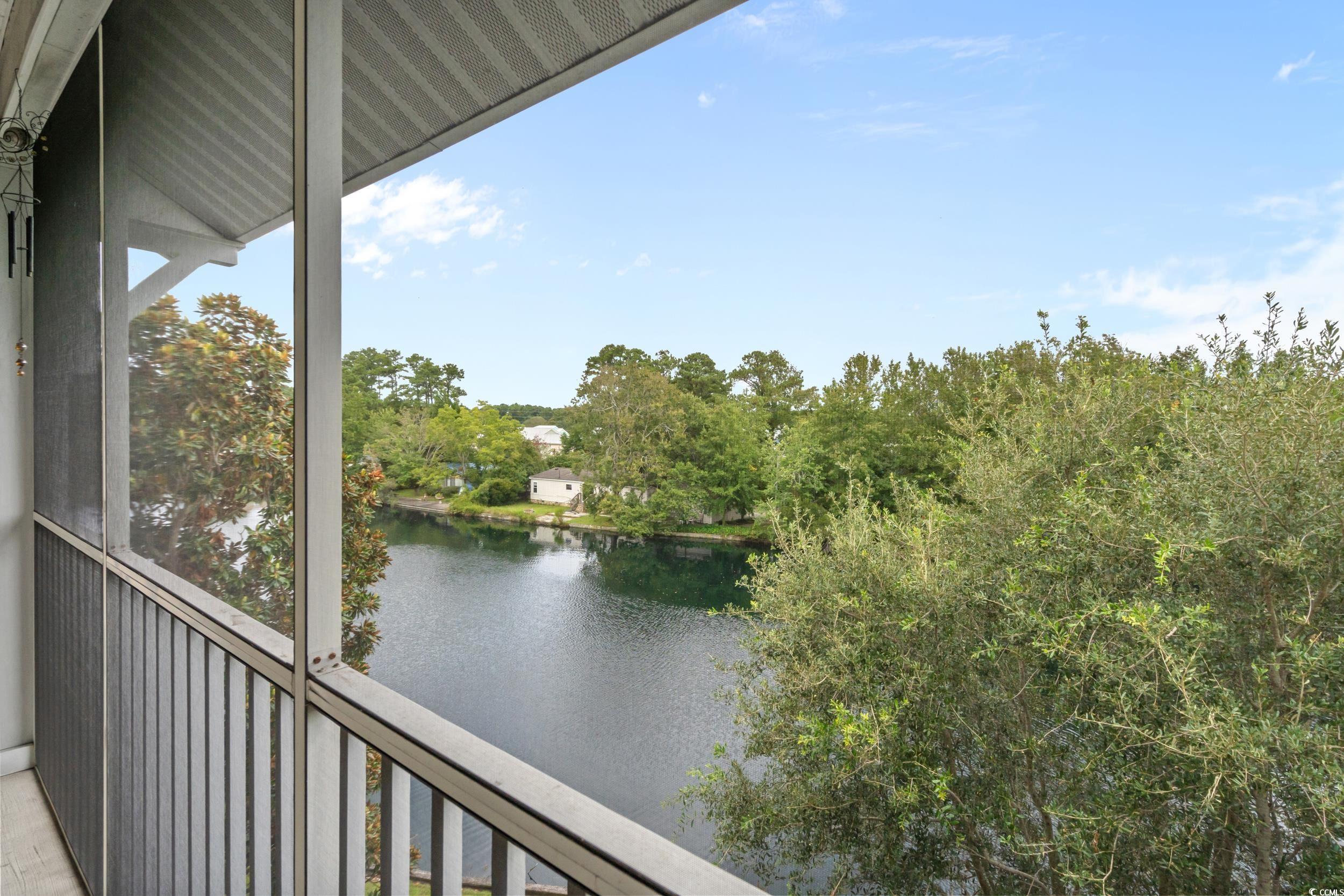 70 Addison Cottage Way, Unit 322 Murrells Inlet, SC 29576 - Photo 29 of 40 Balcony featuring a sunroom and a water view