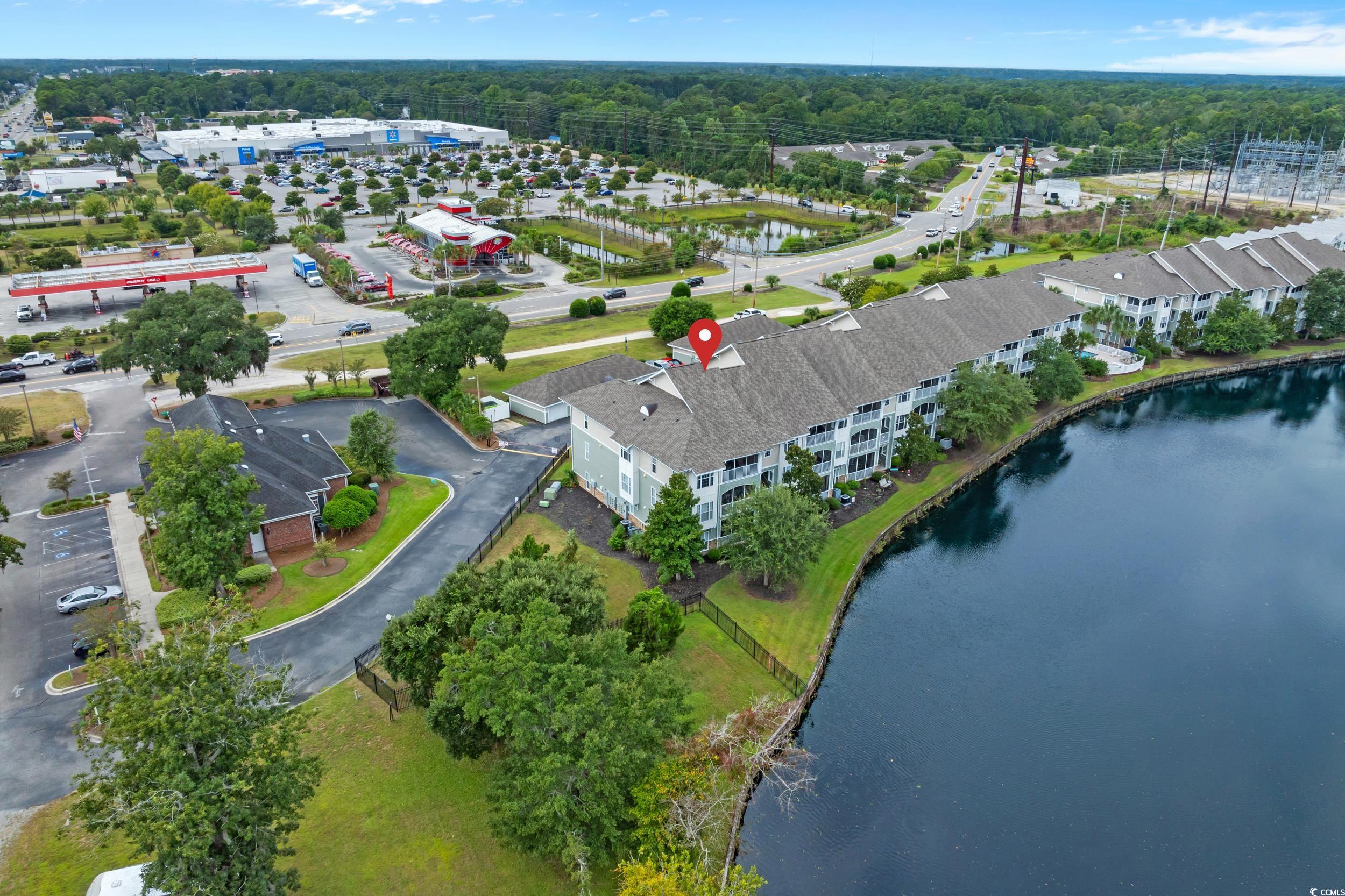 70 Addison Cottage Way, Unit 322 Murrells Inlet, SC 29576 - Photo 39 of 40 Aerial view of property's location with a nearby body of water