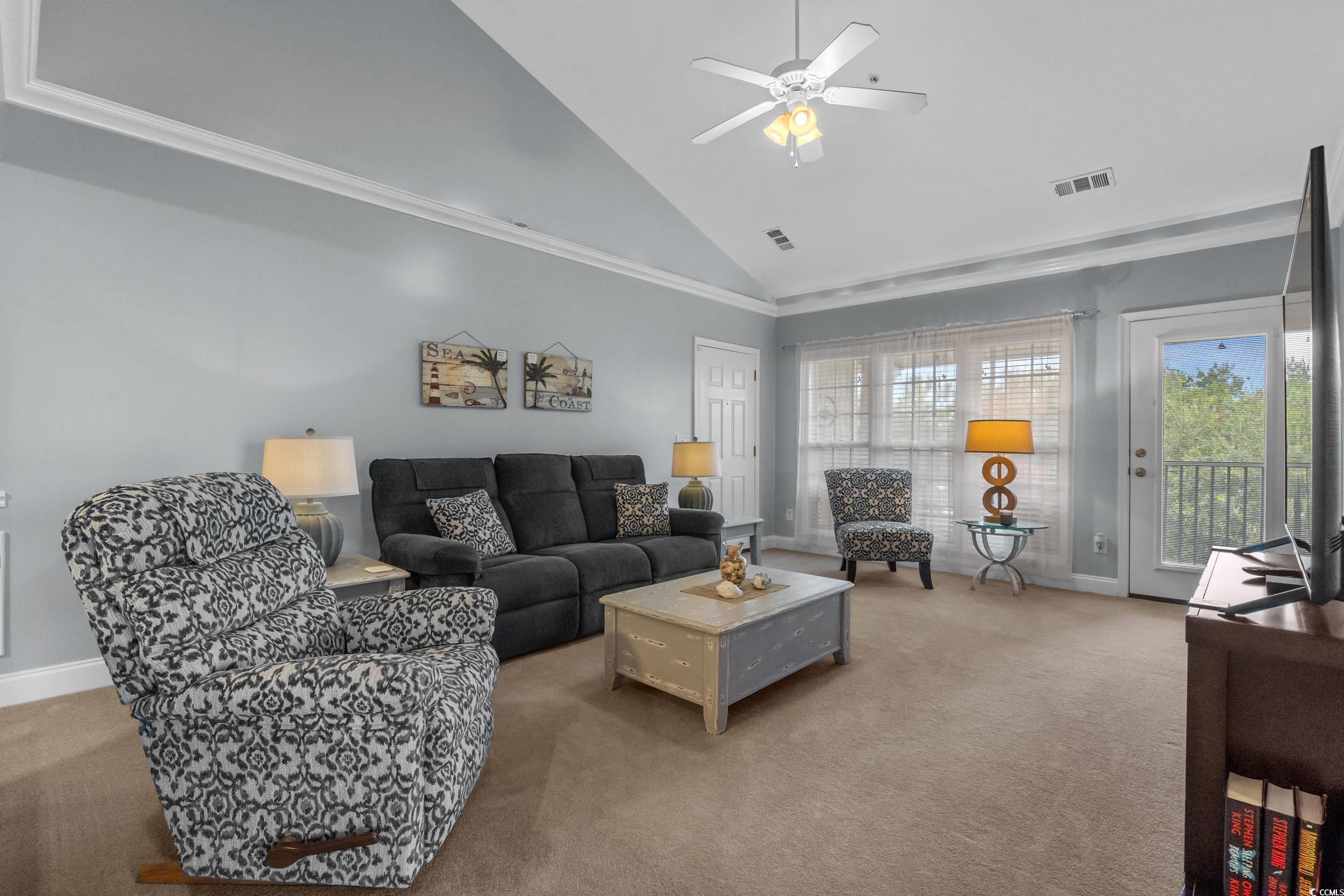 70 Addison Cottage Way, Unit 322 Murrells Inlet, SC 29576 - Photo 7 of 40 Carpeted living room with high vaulted ceiling and ceiling fan