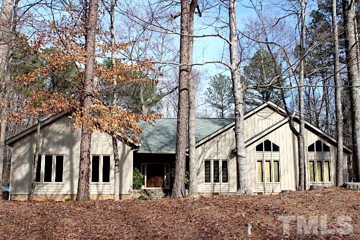 10700 Dunhill Terrace Raleigh, NC 27615 - Photo 1 of 16 a front view of a house with a tree