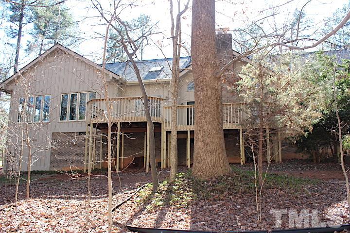 10700 Dunhill Terrace Raleigh, NC 27615 - Photo 14 of 16 a view of a house with yard