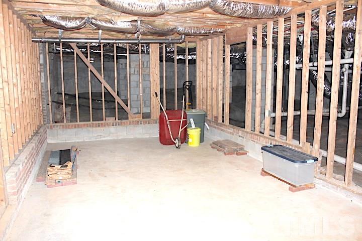 10700 Dunhill Terrace Raleigh, NC 27615 - Photo 16 of 16 a view of small space in front of house