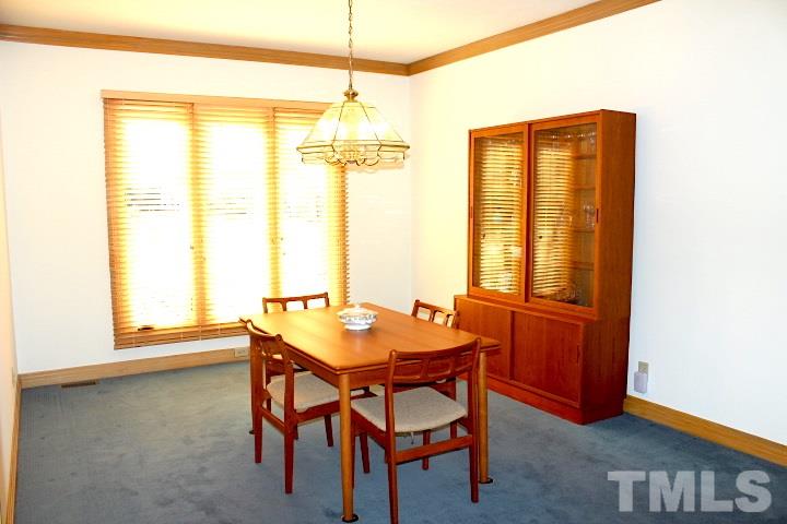 10700 Dunhill Terrace Raleigh, NC 27615 - Photo 5 of 16 a dining room with furniture and window