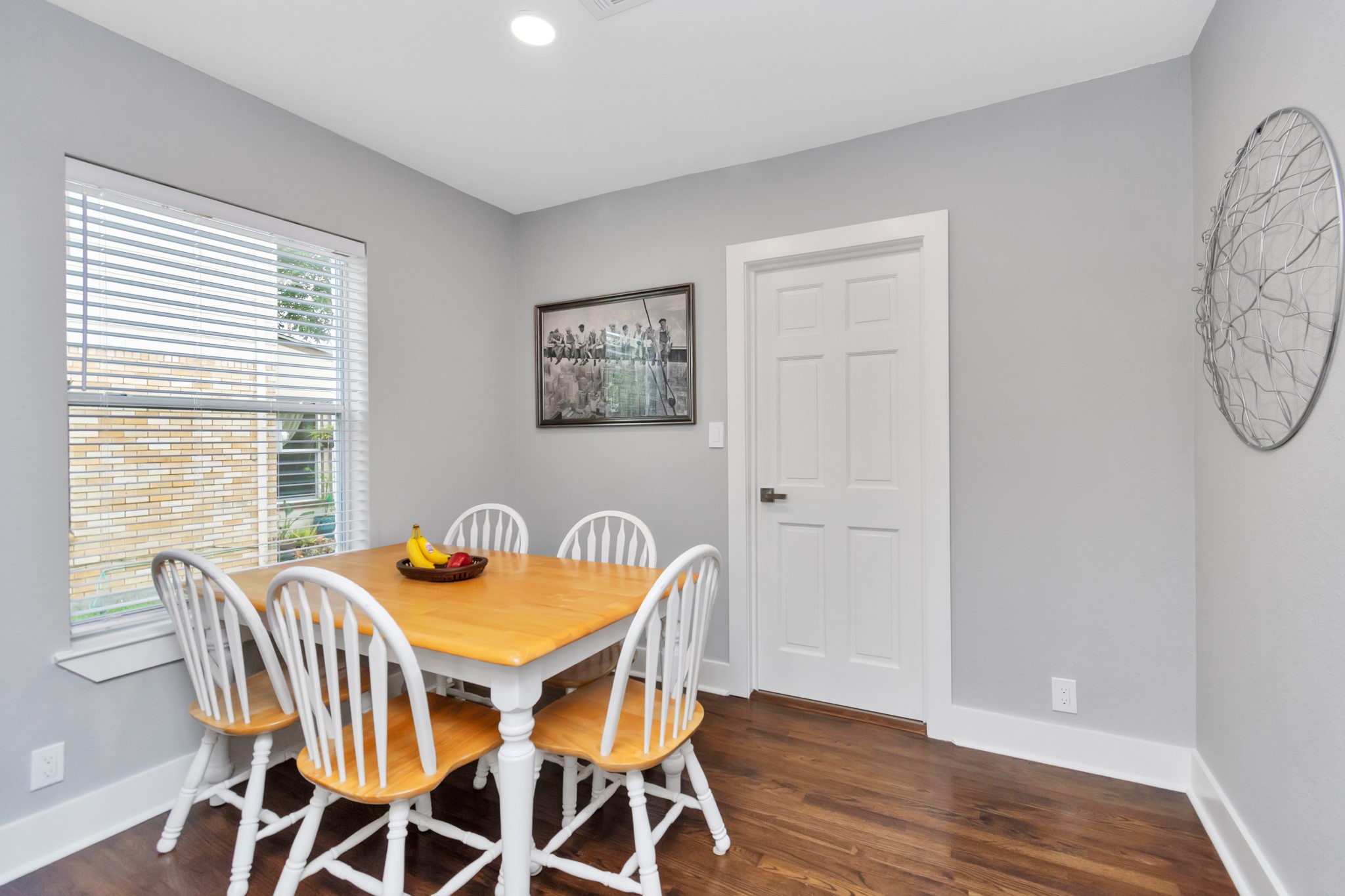 3315 Rosedale Street Houston, TX 77004 - Photo 13 of 32 a view of a dining room with furniture window and wooden floor