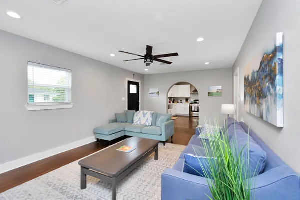 a living room with furniture and a window