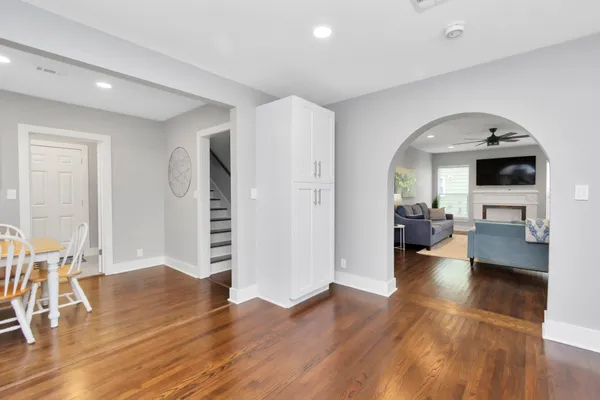 a view of a living room and dining room