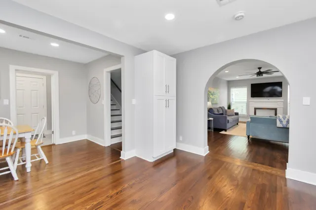 a view of a living room and dining room