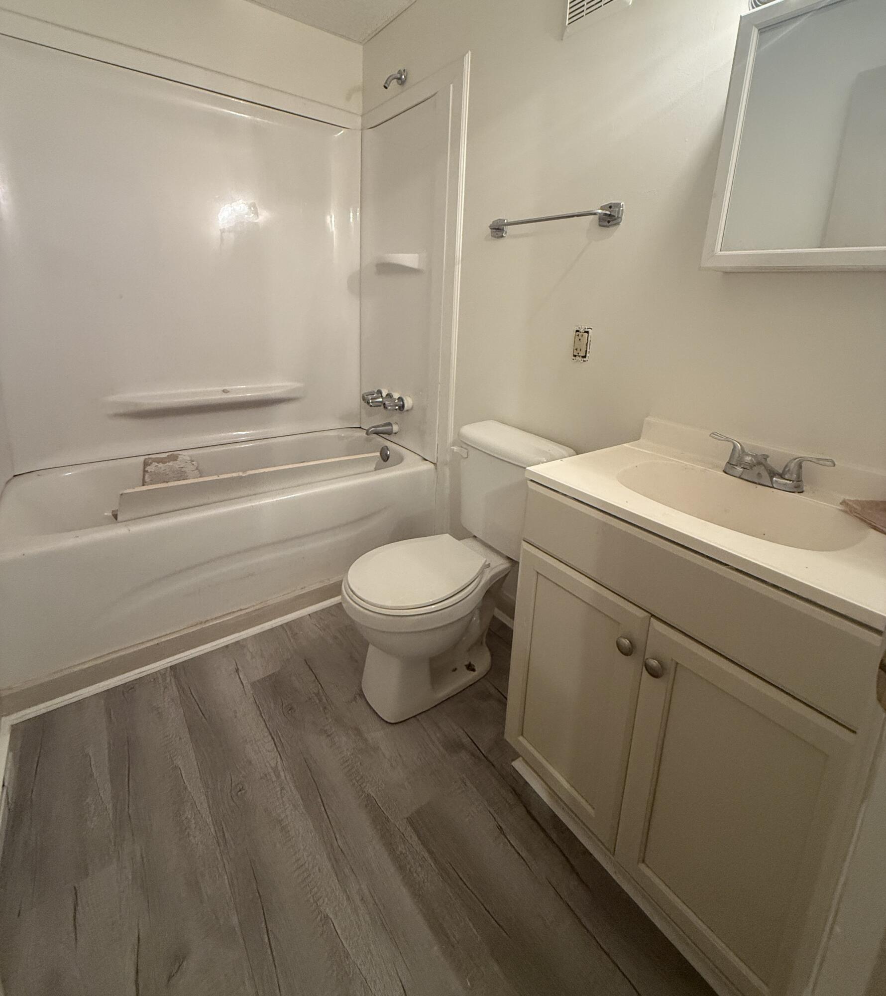 79 Ridgemont Circle Collinsville, VA 24078 - Photo 9 of 11 a bathroom with a sink toilet vanity and shower