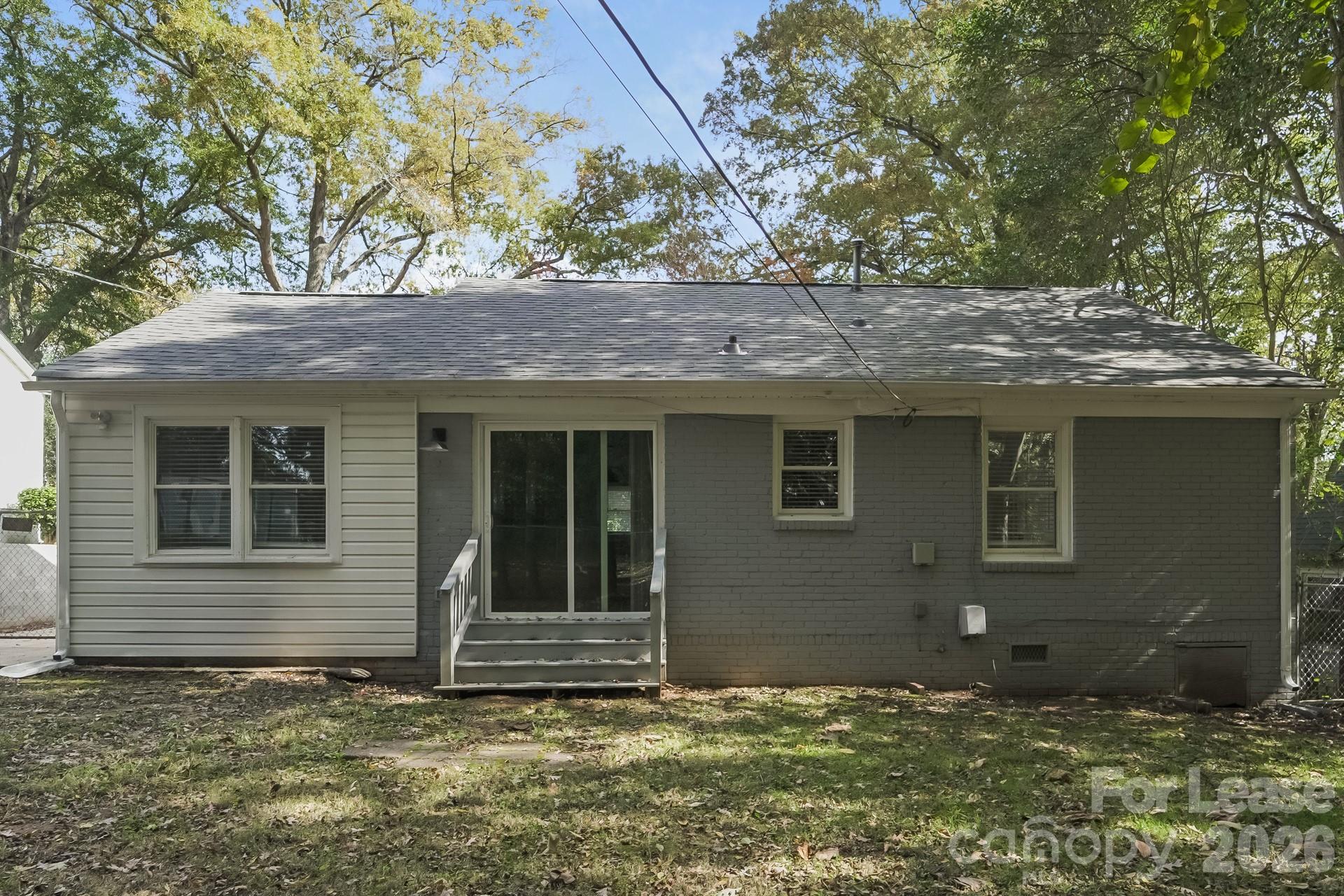 2824 Beech Nut Road Charlotte, NC 28208 - Photo 15 of 16 a view of a house with a tree
