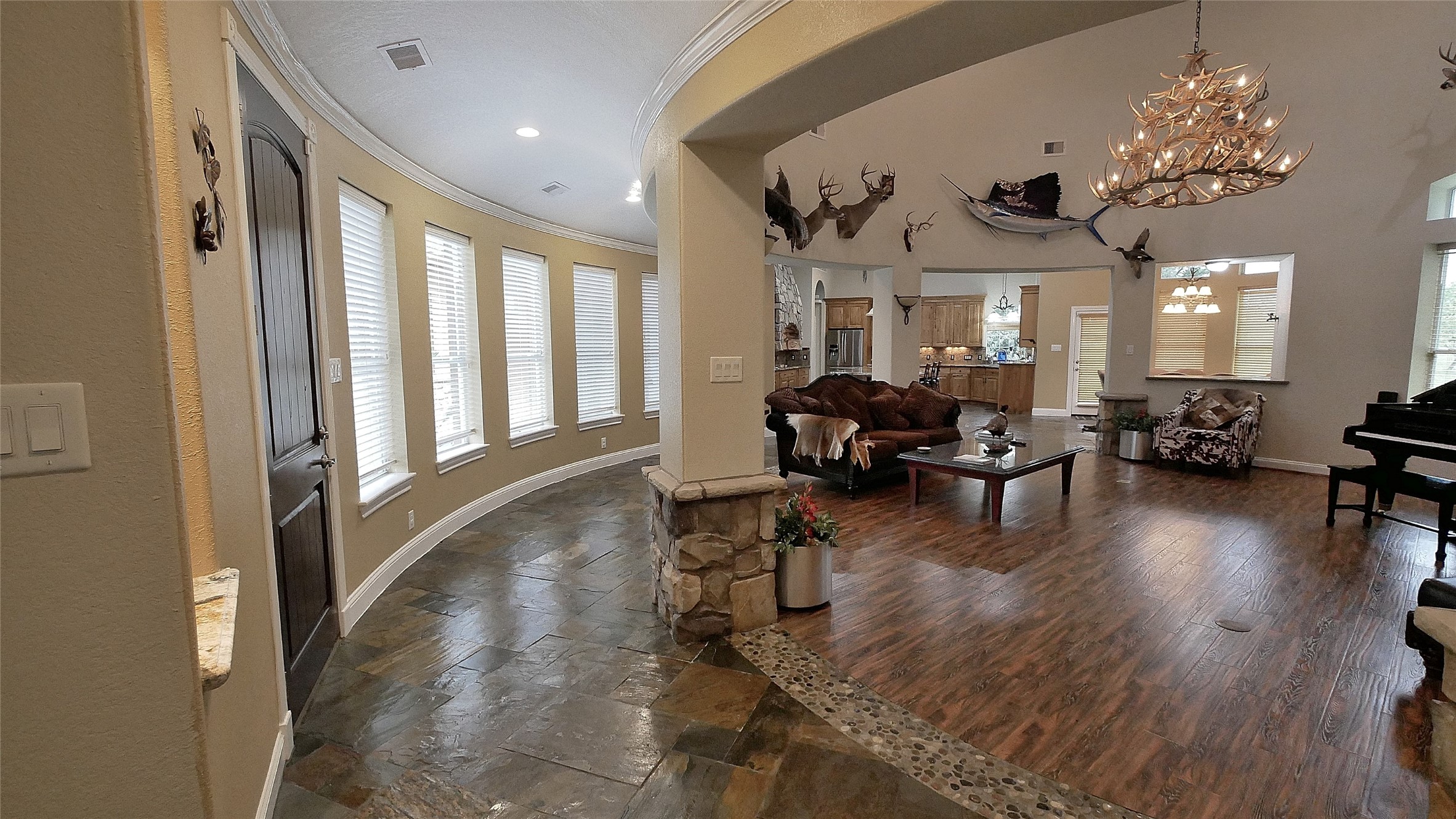 23478 Bays Chapel Road Richards, TX 77873 - Photo 13 of 49 a living room with furniture and a chandelier