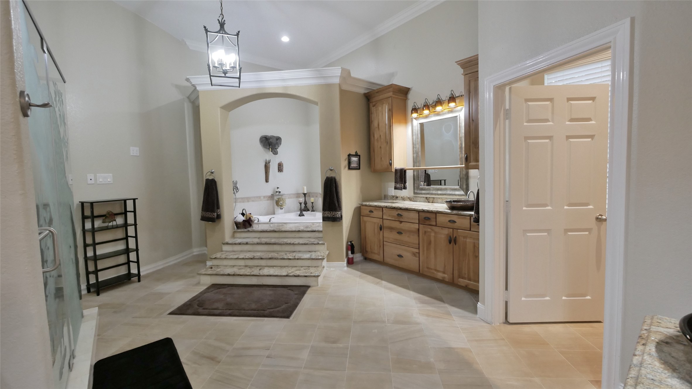 23478 Bays Chapel Road Richards, TX 77873 - Photo 23 of 49 a bathroom with a double vanity sink a mirror a vanity and a shower