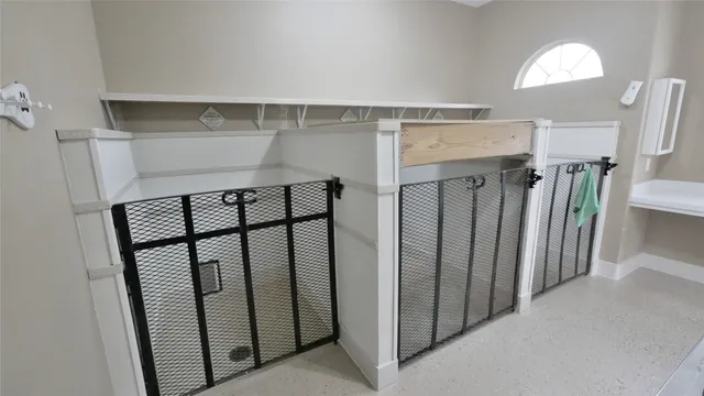 a view of staircase with white walls and stairs