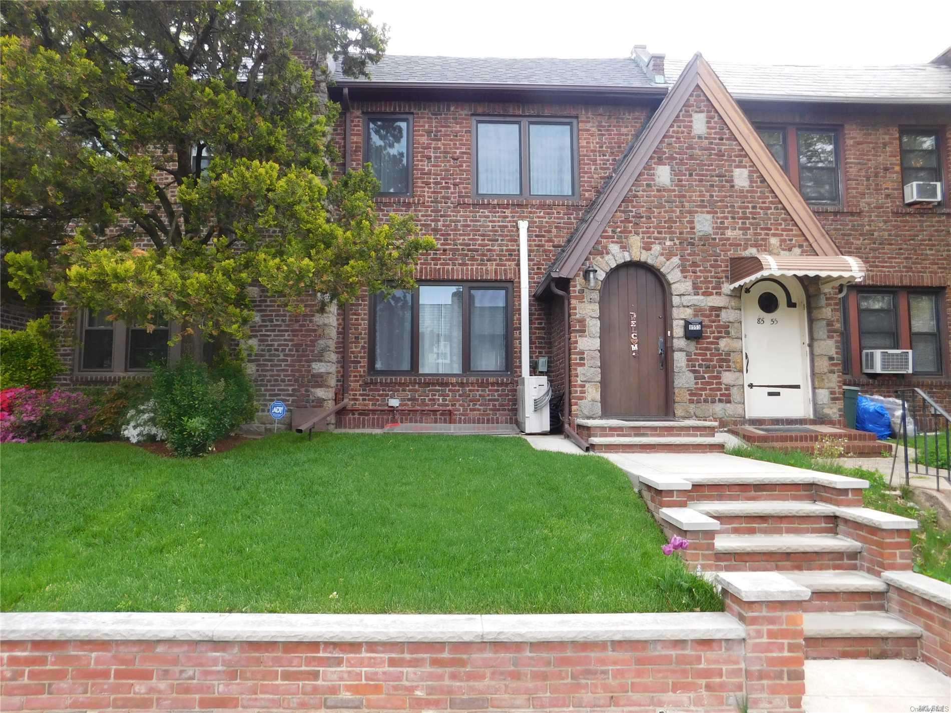 a view of house with garden