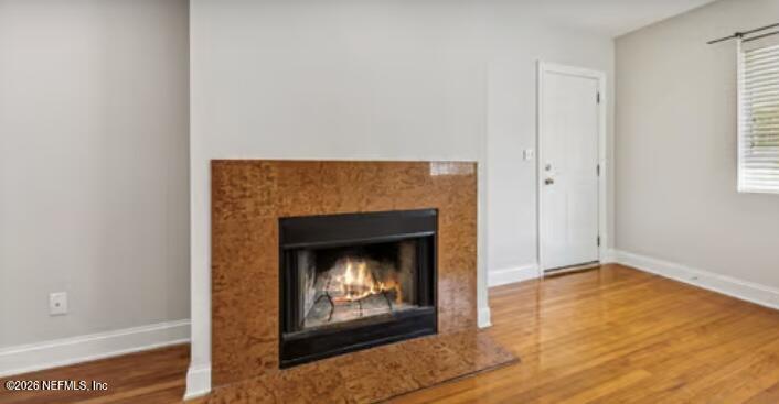 2159 Riverside Avenue, Unit 7 Jacksonville, FL 32204 - Photo 9 of 29 a living room with a fireplace
