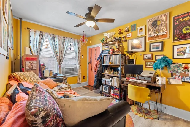 a bed room with a bed and a window