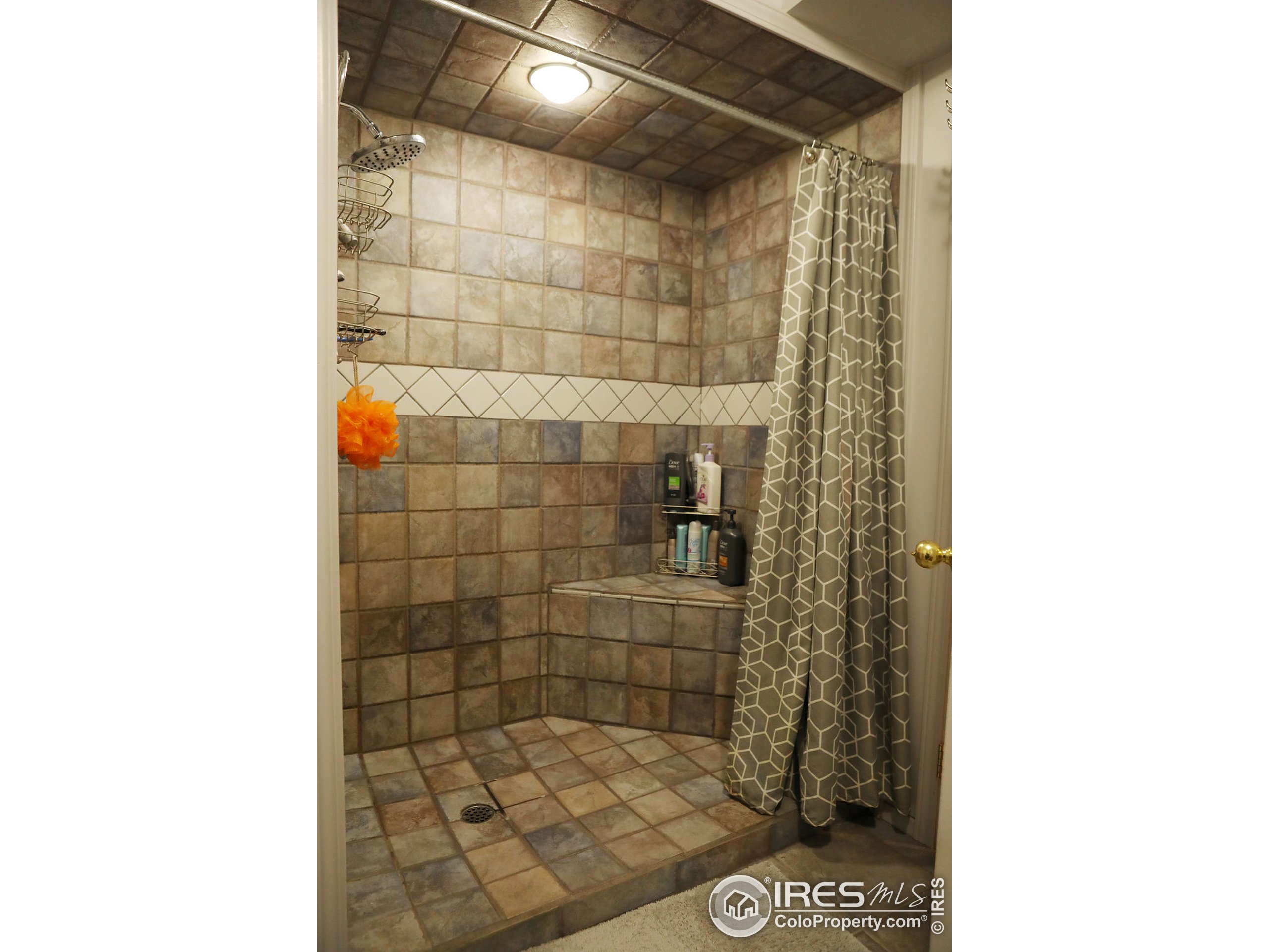 1150 County Rd M 5/10 Wiggins, CO 80654 - Photo 17 of 31 a bathroom with a shower