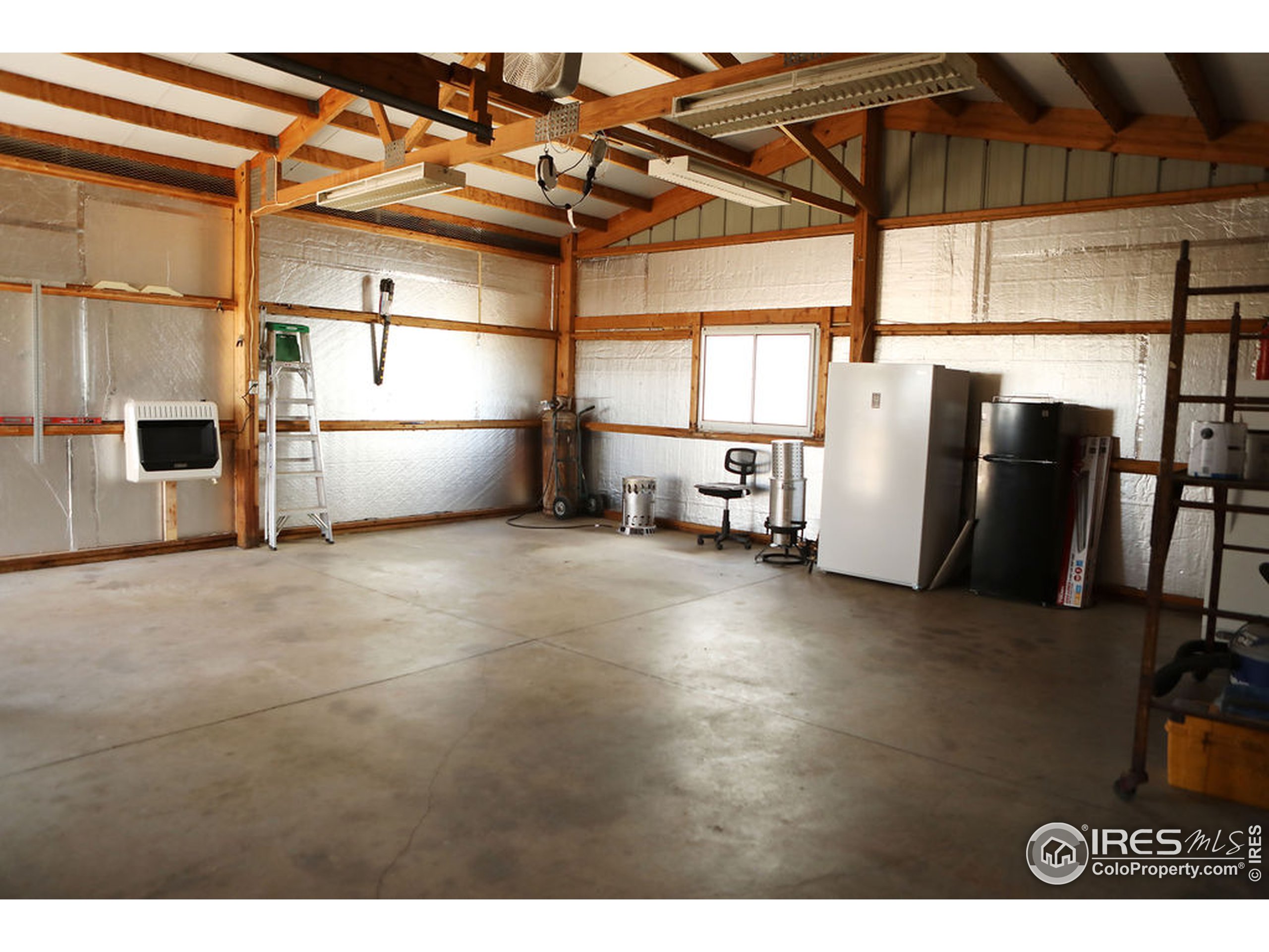 1150 County Rd M 5/10 Wiggins, CO 80654 - Photo 19 of 31 a view of a storage & utility room