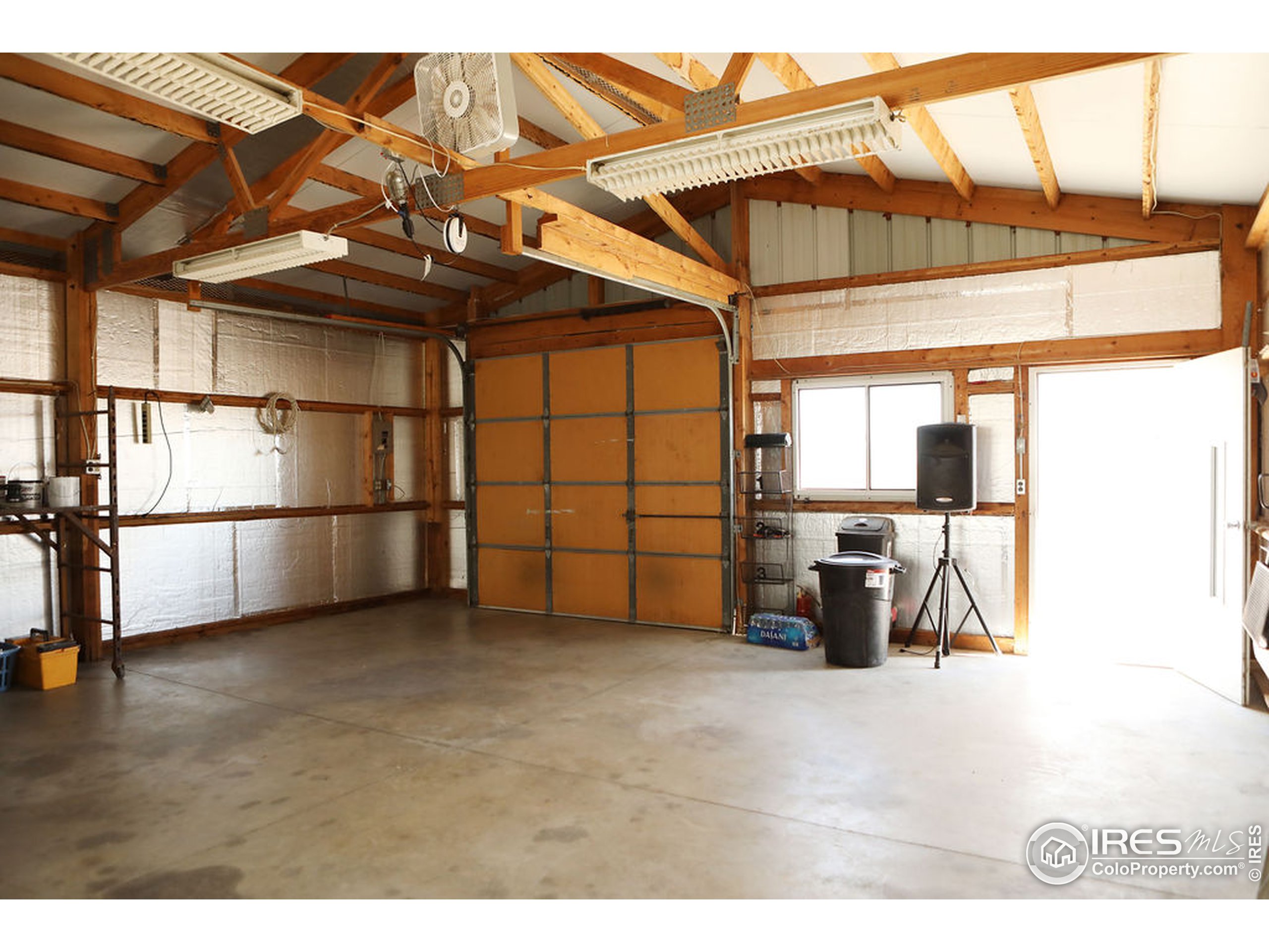 1150 County Rd M 5/10 Wiggins, CO 80654 - Photo 20 of 31 a view of a room with gym equipment