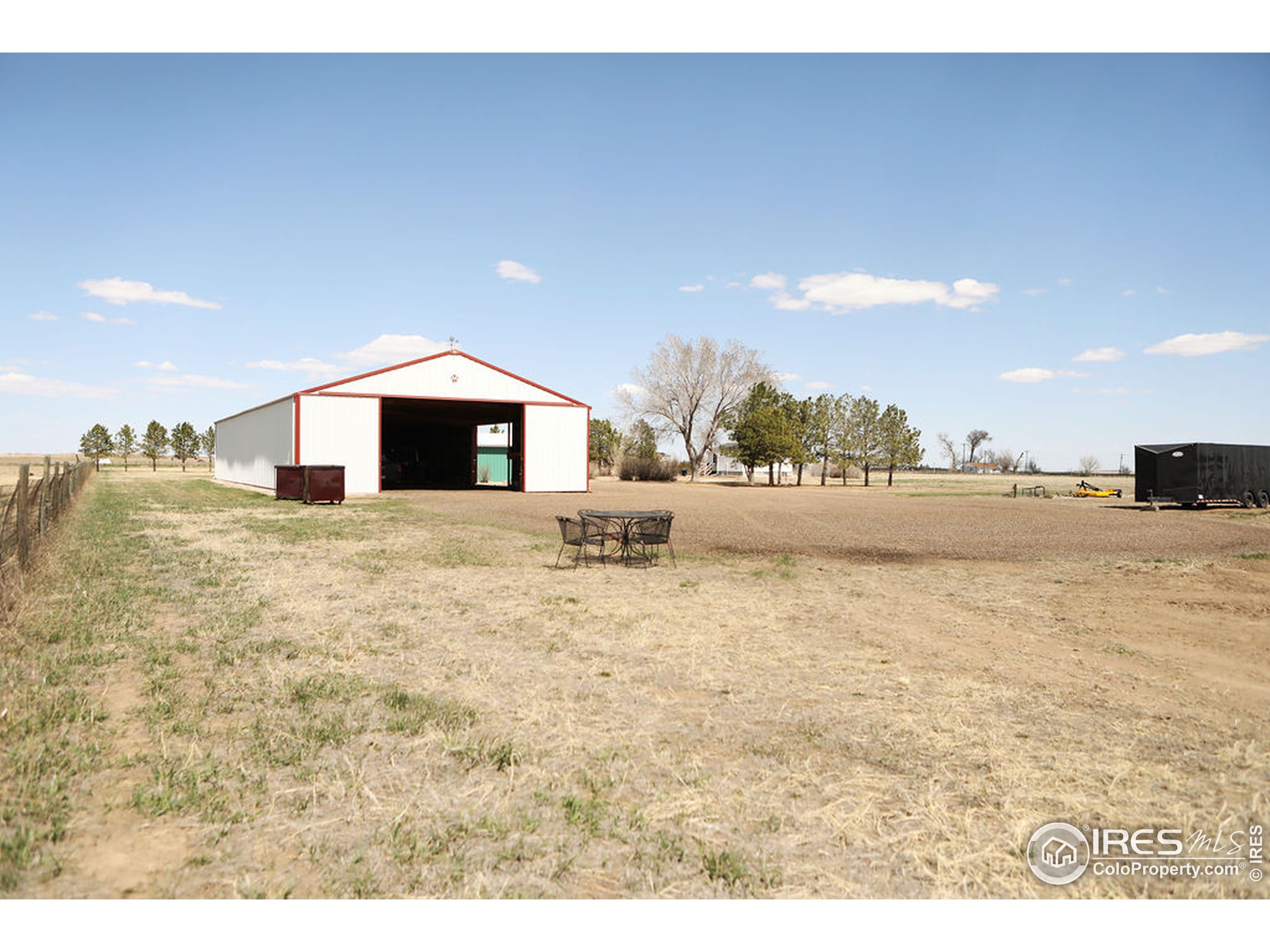 1150 County Rd M 5/10 Wiggins, CO 80654 - Photo 21 of 31 a swimming pool with a outdoor space