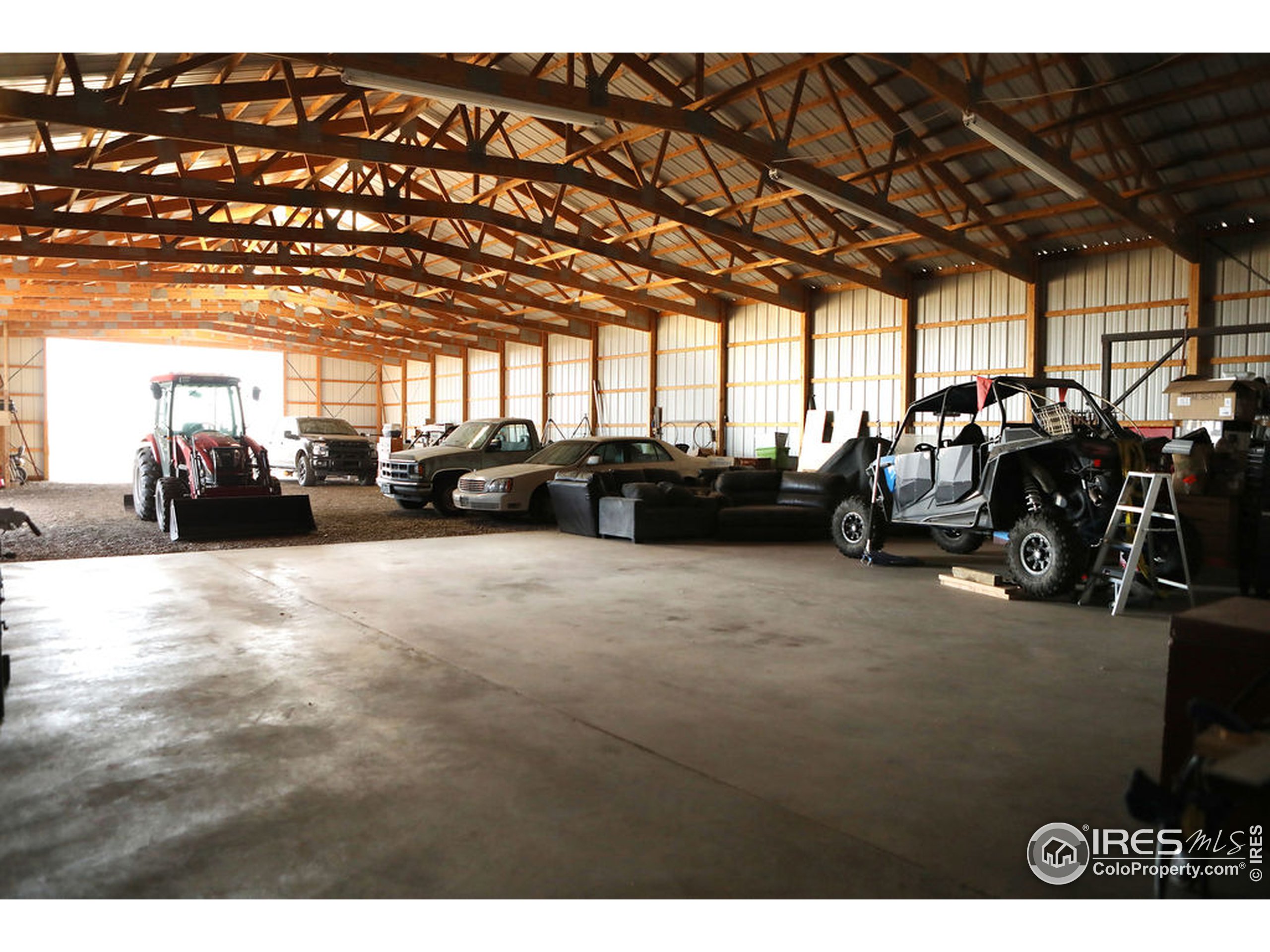 1150 County Rd M 5/10 Wiggins, CO 80654 - Photo 24 of 31 a view of a room with gym equipment