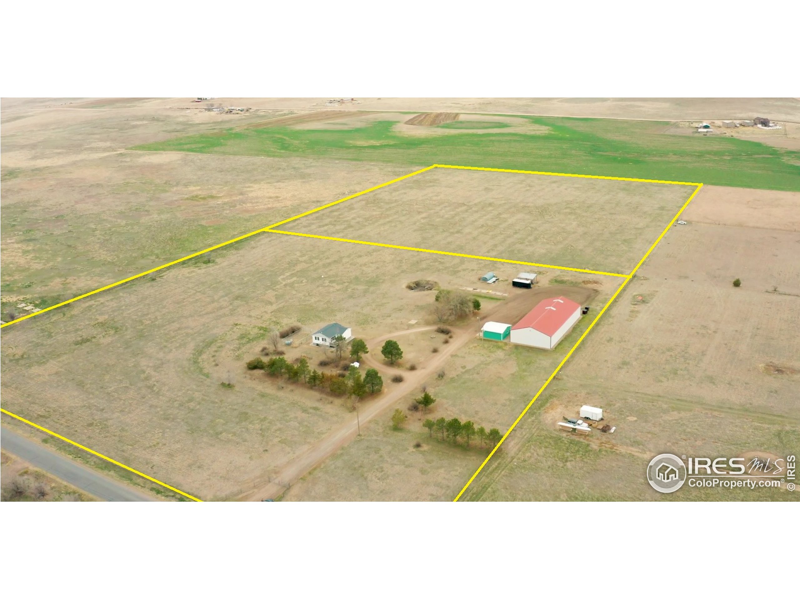 1150 County Rd M 5/10 Wiggins, CO 80654 - Photo 25 of 31 a view of an outdoor space