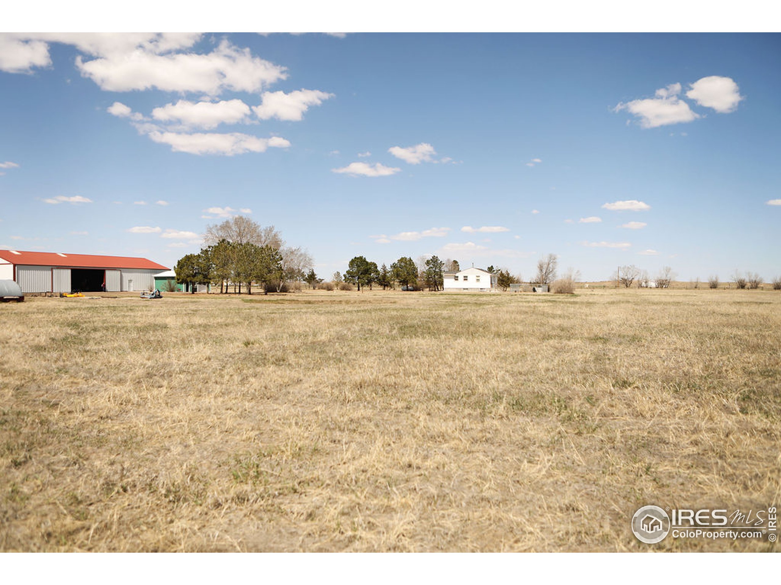 1150 County Rd M 5/10 Wiggins, CO 80654 - Photo 30 of 31 a view of ocean