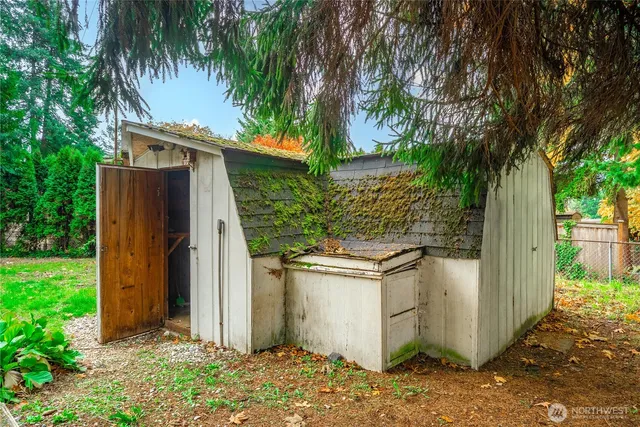 a backyard of a house with lots of green space