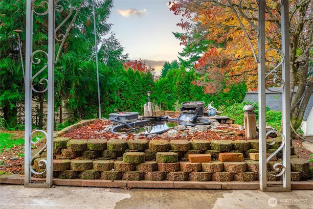 a view of yard with patio