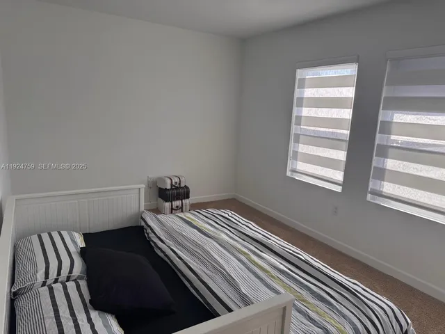 a view of bedroom and bedroom