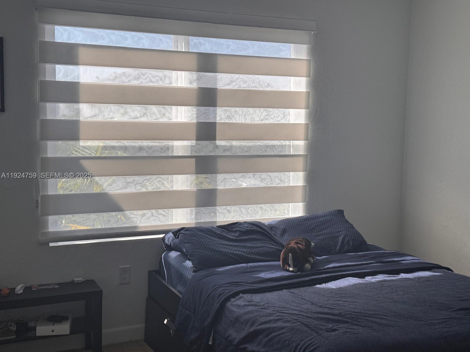 13201 Southwest 269th Terrace Homestead, FL 33032 - Photo 22 of 33 a view of bedroom with a window