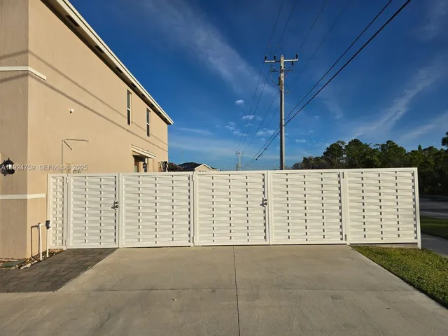 a view of a wooden fence