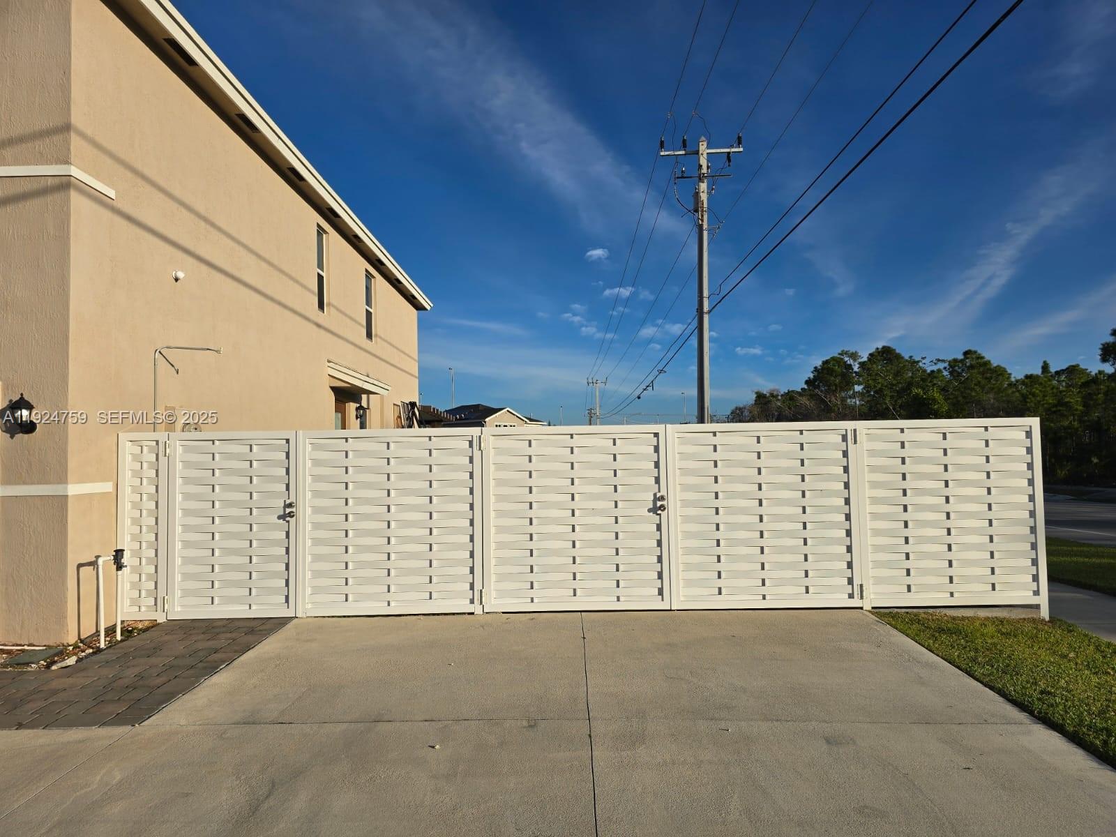 13201 Southwest 269th Terrace Homestead, FL 33032 - Photo 32 of 33 a view of a wooden fence