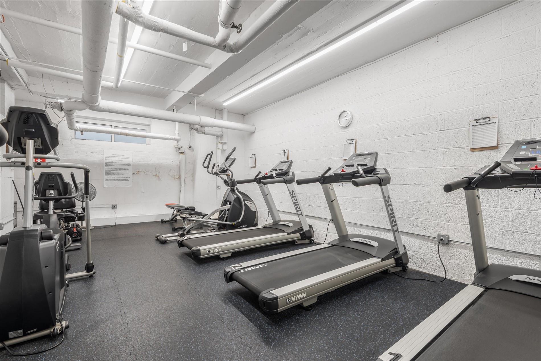 34-41 85th Street, Unit 4S Queens, NY 11372 - Photo 17 of 20 Workout area with concrete block wall