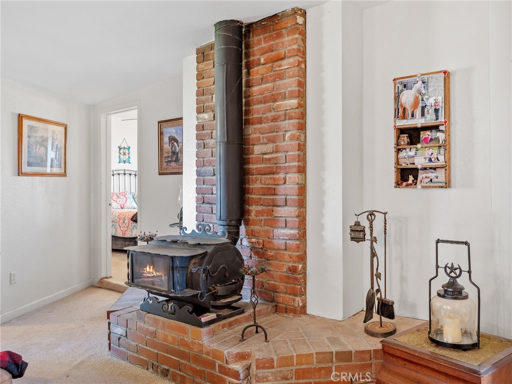 22977 El Centro Road Apple Valley, CA 92307 - Photo 11 of 30 a room with a table and gym equipment