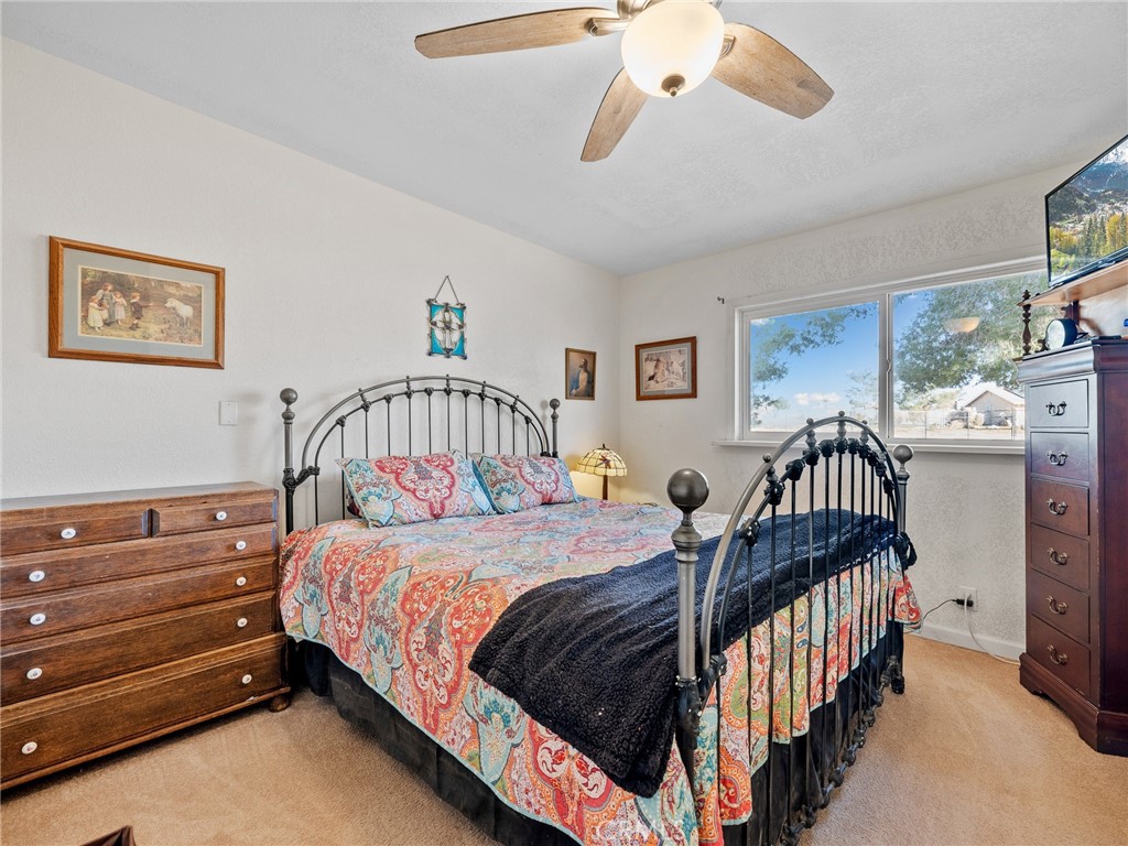 22977 El Centro Road Apple Valley, CA 92307 - Photo 21 of 30 a bedroom with bed and a window