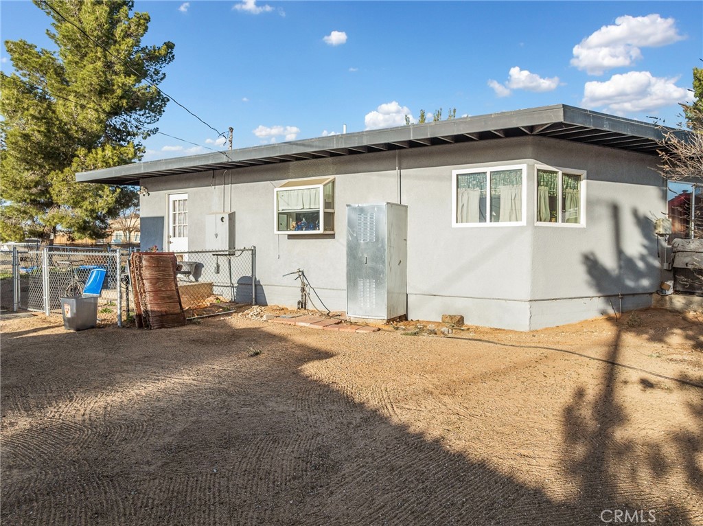 22977 El Centro Road Apple Valley, CA 92307 - Photo 26 of 30 a view of a house with a patio