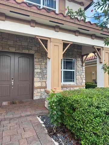 a view of a pathway with a house