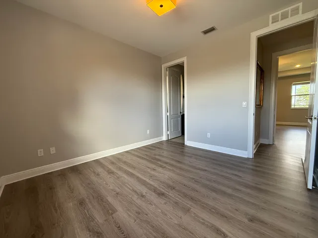 a view of a hallway with entryway