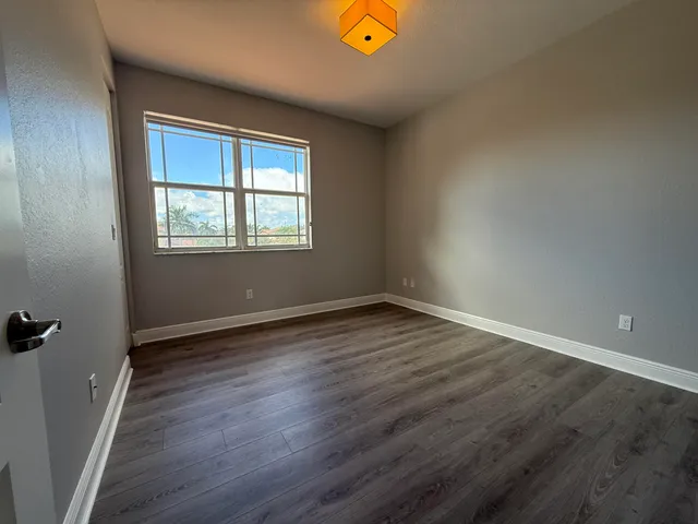 a living room with furniture fireplace and a flat screen tv