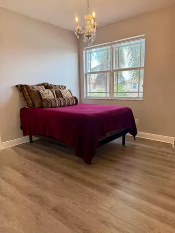 a view of an outdoor space and tennis court