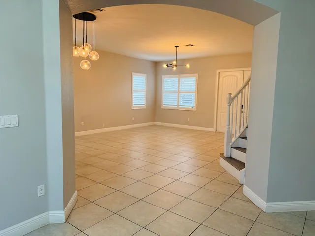 a kitchen with stainless steel appliances a stove a microwave and cabinets