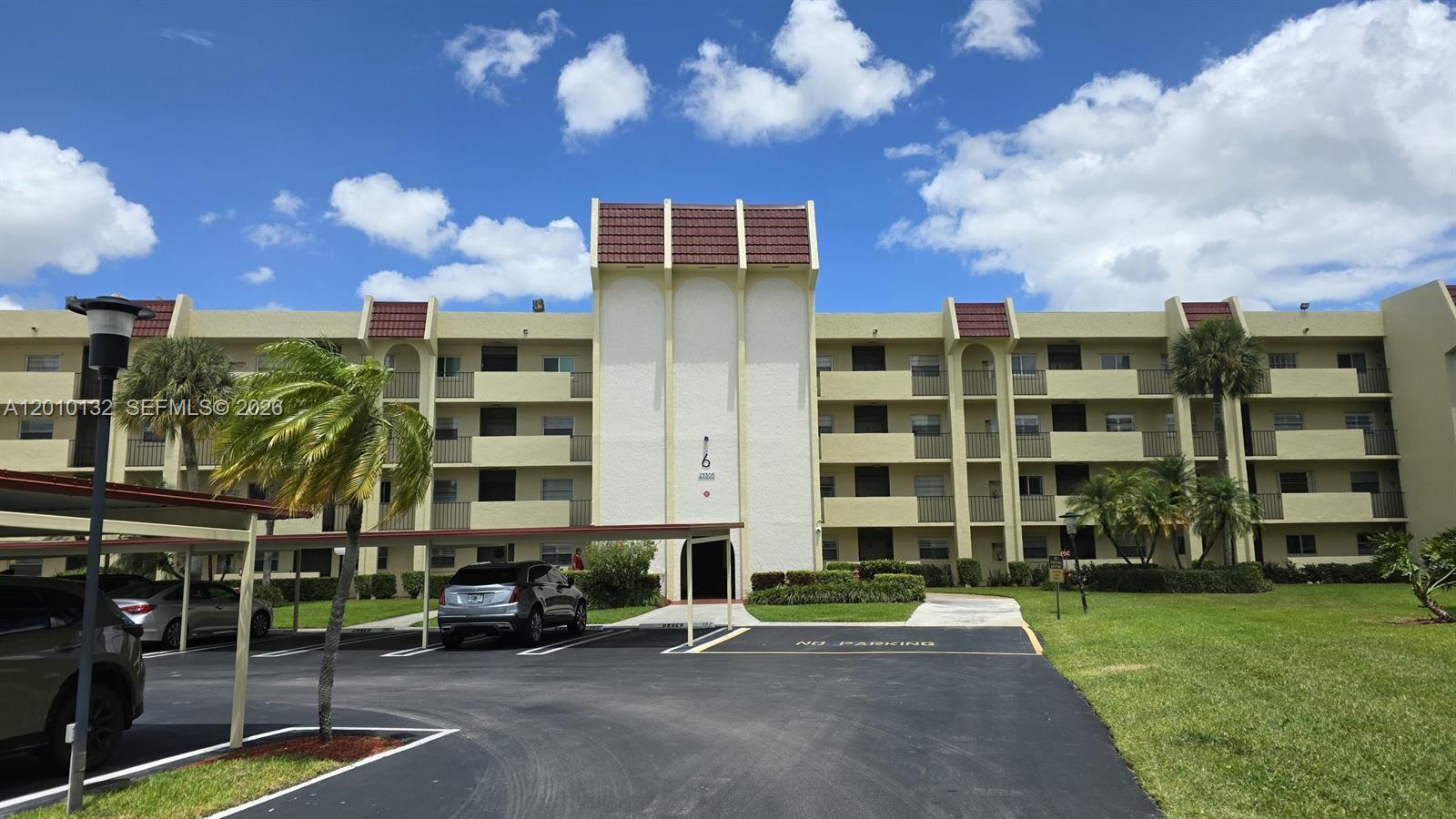 a front view of a building with street view