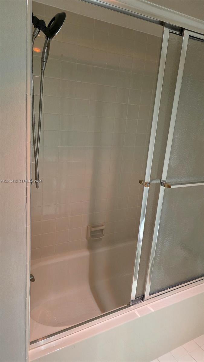 23305 Barwood Lane North, Unit 207 Boca Raton, FL 33428 - Photo 14 of 27 a bathroom with a shower