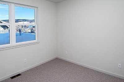 829 Sylvan Lake Road, Unit 4 Eagle, CO 81631 - Photo 3 of 7 a view of a small space with wooden floor and a window