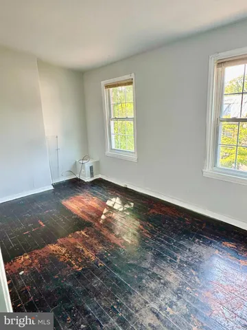 a bathroom with a toilet and a sink